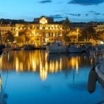 Cannes, France at night, with lit up buildings
