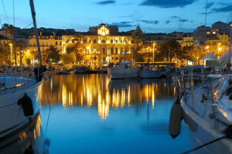 Cannes, France at night, with lit up buildings